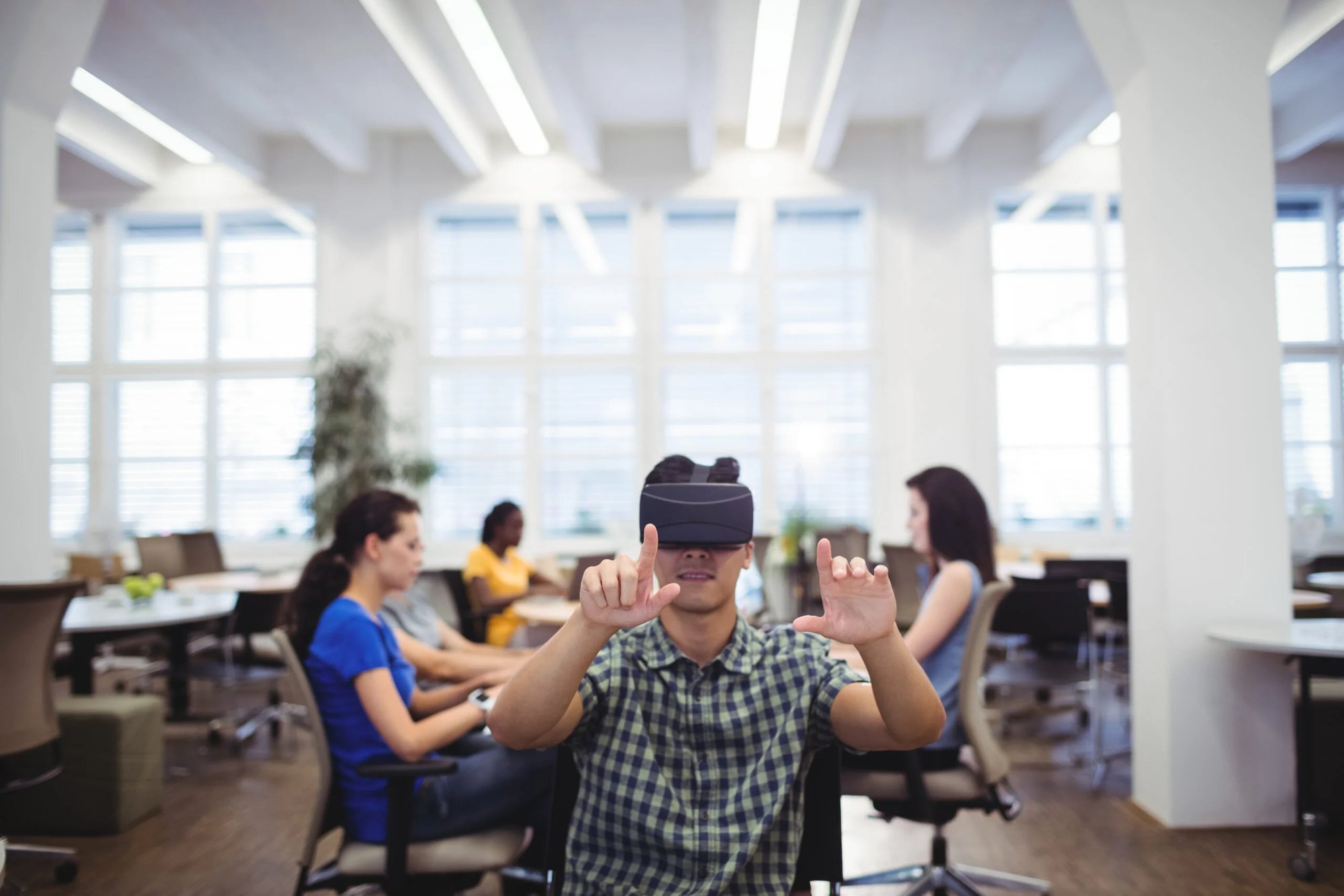man-using-virtual-reality-headset-scaled